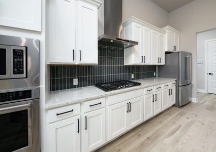 Kitchen with stainless steel appliances.