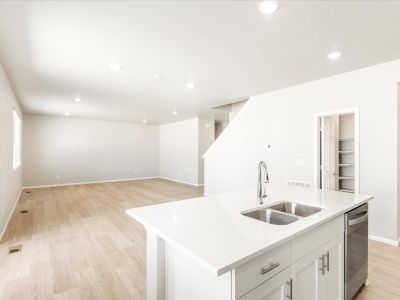 Kitchen in the Wateron floorplan at a Meritage Homes community in Brighton, CO.