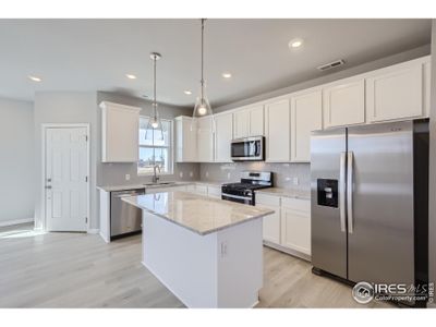 Check out this gleaming kitchen with an included refridgerator!