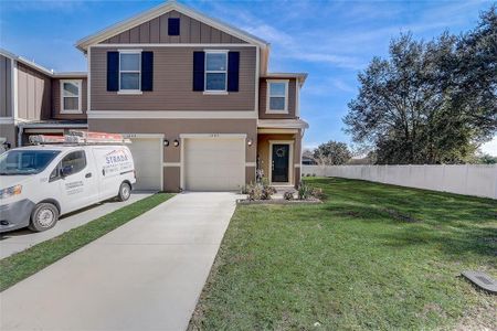 New construction Townhouse house 1440 Mirabella Circle, Davenport, FL 33897 - photo 0