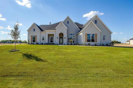 View of front of home with a front yard