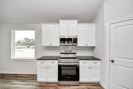 New construction Single-Family house 12825 Naval Dr, Conroe, TX 77306 plan Magnolia - image 12