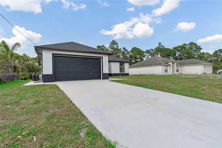 New construction Single-Family house 1113 Enrique St E, Lehigh Acres, FL 33974 - image