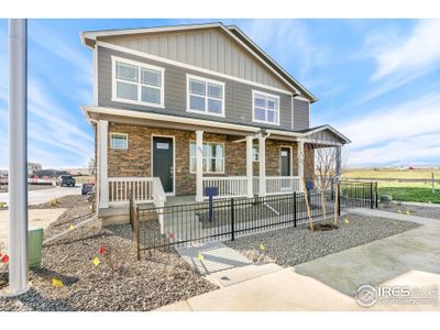 New construction Duplex house 599 Thoroughbred Ln, Johnstown, CO 80534 - photo 0