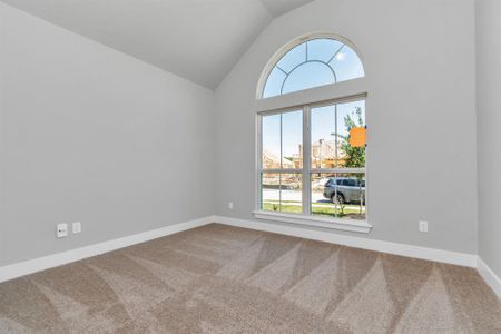 Generously sized secondary bedrooms, plush carpeting underfoot, and ample natural light flooding through the large windows. With spacious closets to accommodate all your storage needs, this bedroom offers comfort and functionality in equal measure. Sample photo of completed home. Actual colors and selections may vary.