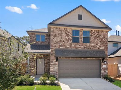 New construction Single-Family house 9332 Hard Rock Road, Conroe, TX 77303 Carson Homeplan- photo 0