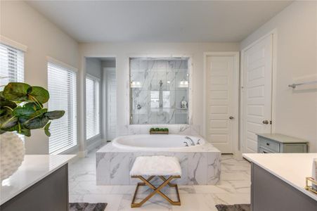 Every inch of this home spells luxurious details including the master bathroom!