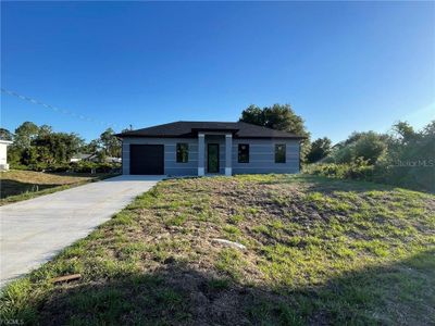 New construction Single-Family house 707 Ledge St, Lehigh Acres, FL 33972 - image
