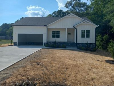 New construction Single-Family house 214 Willowridge Drive, Sanford, NC 27332 - photo 0