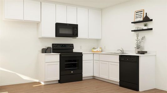 Kitchen with light wood-type flooring, sink, white cabinetry, and black appliances