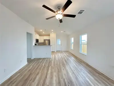 The kitchen overlooks the living room and dining area so that you never miss a beat as you prep your next meal.