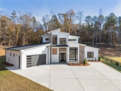 New construction Single-Family house 1676 Thomas Drive, Hoschton, GA 30548 - photo 0