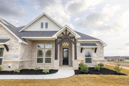 View of front of property with a front lawn