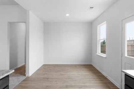 Dining room featuring light wood-style floors