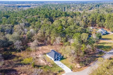 New construction Single-Family house 164 County Rd 3370, Cleveland, TX 77327 - image