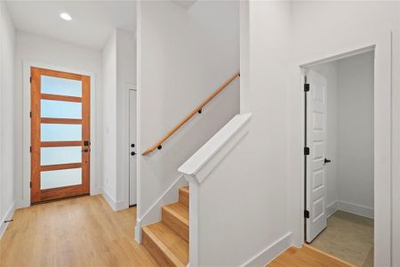 Foyer entrance featuring light hardwood / wood-style flooring