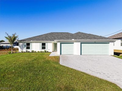 New construction Single-Family house 1906 Nw 21St Pl, Cape Coral, FL 33993 plan The Paradise Cove - image