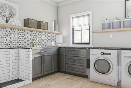 Handy counter space in a dedicated utility room with a dog shower &  plenty of cabinet storage.