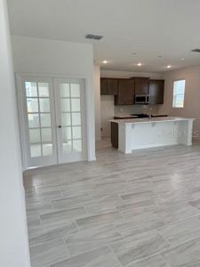 New construction Single-Family house 27417 Black Kite Ave, Howey-in-the-Hills, FL 34737 Sanibel- photo 1 1