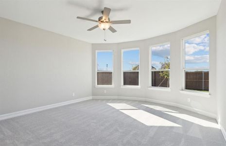 Elegant owner's suite with Bay window *real home pictured