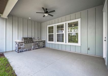 Cooking out is a breeze with a covered outdoor kitchen.