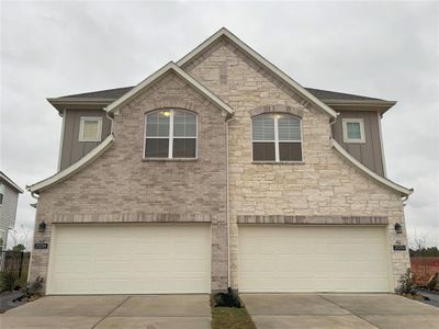 New construction Townhouse house 21254 Black Gap Wildlife, Cypress, TX 77433 Retreat - Villas- photo 0