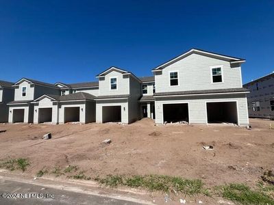 New construction Townhouse house 14515 Macadamia Lane, Unit 311, Jacksonville, FL 32218 - photo 0