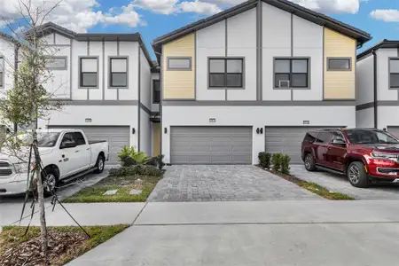 New construction Townhouse house 10412 Ebb Tide Ln, Orlando, FL 32821 - photo 0