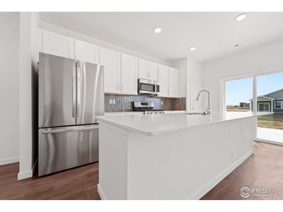 New construction Single-Family house 450 Buckboard Dr, Hudson, CO 80642 - image 7