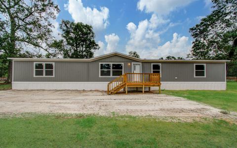 New construction Single-Family house 148 County Road 328, Cleveland, TX 77327 - photo 0