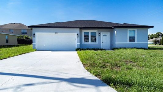 New construction Single-Family house 102 Columbia Drive, Poinciana, FL 34759 - photo 0