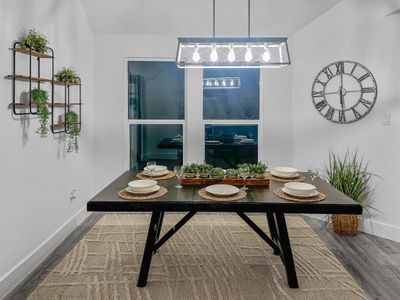 Dining space featuring vinyl plank flooring