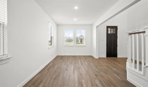 The lovely dining room is right off the main entry - just imagine your lovely furnishings filling this gorgeous room!