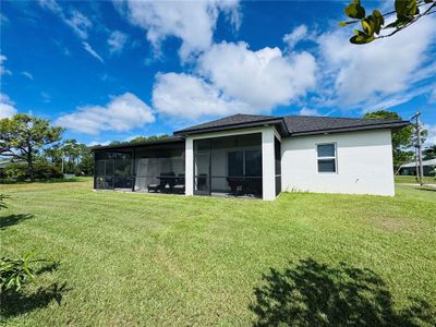 New construction Single-Family house 528 Jacaranda Pkwy E, Cape Coral, FL 33909 - image