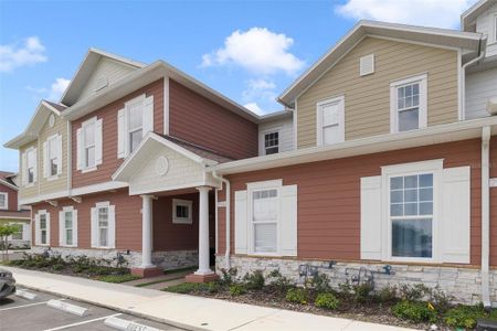 New construction Townhouse house 7554 Sunflower Circle, Kissimmee, FL 34747 - photo 0