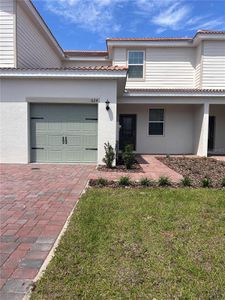 New construction Townhouse house 624 Bay Leaf Drive, Poinciana, FL 34759 - photo 0