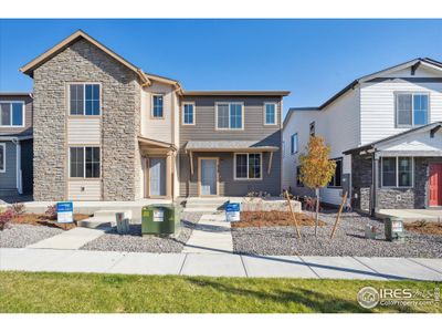 New construction Duplex house 238 Shoveler Way, Johnstown, CO 80534 Congaree- photo 0