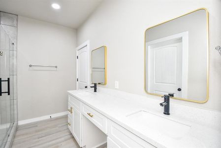 Primary En-Suite Bathroom with Large Shower and Double Sinks