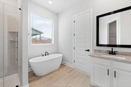 Relax in the large soaking tub or enjoy the spacious, standing shower.