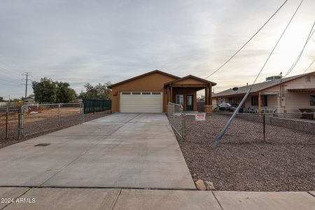 New construction Single-Family house 5647 E Calle Pitaya, Guadalupe, AZ 85283 - photo 0