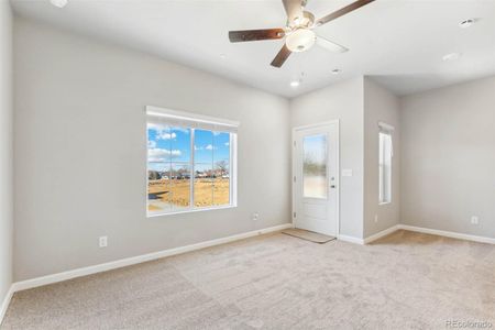 New construction Townhouse house 157 Robin Road, Johnstown, CO 80534 - photo 0