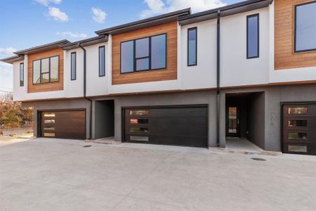 Exterior wrapped in premium stucco with cedar accents