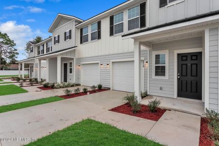 New construction Townhouse house 6019 Carolines Court, Jacksonville, FL 32277 - photo 0