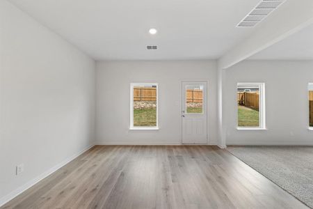 Dining room with light wood-style flooring