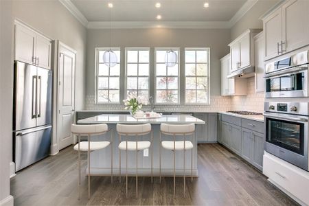 Image of inventory home with similar floorplan. Virtually staged to show use of space.