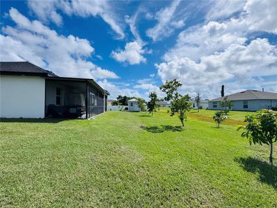 New construction Single-Family house 528 Jacaranda Pkwy E, Cape Coral, FL 33909 - image