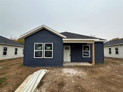 New construction Single-Family house 1404 E Leuda Street, Fort Worth, TX 76104 - photo 0