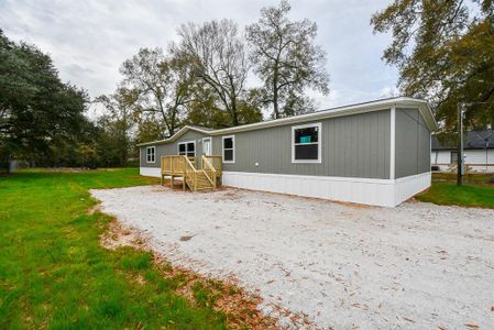 New construction Single-Family house 176 County Road 328, Cleveland, TX 77327 - photo 0