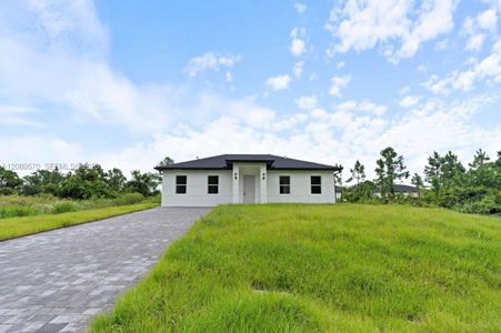 New construction Single-Family house 708 Peacock Ave, Lehigh Acres, FL 33974 - image