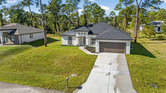 New construction Single-Family house 220 Lomax Ave, Lehigh Acres, FL 33974 - image